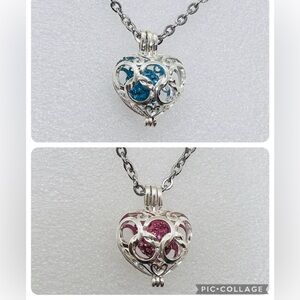 Beautiful Silver plated bubble Heart caged charm with bead & 24 in necklace .